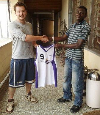 Dominic reseiving strips from Kevin Anderson of Edinburg Kings