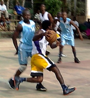 Hoops Point Gurad J. Akpabio explode pass his defender